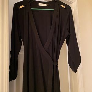 Little black wrap dress. Fits every curve!